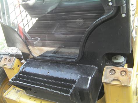 Used caterpillar front skid steer door 